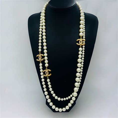 chanel necklace with black disc|long chanel necklace with pearls.